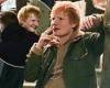 Ed Sheeran puffs on a cigarette and larks around with friends after enjoying ...