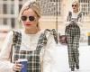 Laura Whitmore looks typically chic in plaid dungarees as she arrives at her ...