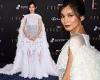 Gemma Chan looks gorgeous in diaphanous white gown with ostrich feather cape at ...