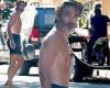 Chris Pine shows off his lean physique as he emerges shirtless from his Los ...