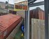 Mother-of-four hits out after neighbour cranes container with smoke-billowing ...