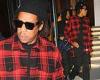 Jay-Z happily signs autographs for diehard fans while exiting his office in New ...