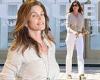 Cindy Crawford is the epitome of casual cool in taupe top and white jeans