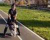 Mush! Rollerblader hitches a speedy ride as she is towed along by a husky ...