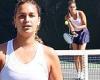 April Love Geary rocks a pleated skirt and a white tank top to play tennis with ...