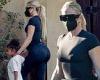 Khloe Kardashian shows off famed derriere in spandex while out with daughter ...