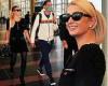 Paris Hilton packs on PDA with fiancé Carter Reum decked out in black ...