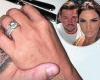 Katie Price flashes her engagement ring as she holds hands with fiancé Carl ...