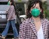 Milla Jovovich rocks bell bottoms and plaid jacket as she meets up with Paul ...