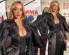 Rita Ora puts on a busty display in black ensemble with plunging neckline and ...