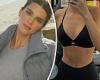 Kendall Jenner shows off her impeccably toned abs while wearing a black Alo ...