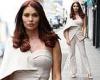 Amy Childs oozes glamour in an eye-catching caped trouser suit as she films The ...
