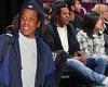 Jay-Z is all smiles as he takes in Brooklyn Nets game with team owner Clara Wu ...