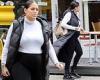 Pregnant Malin Andersson dresses her baby bump in a pale grey jumper and padded ...