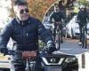 Simon Cowell goes for a morning bike ride with partner Lauren Silverman