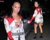 Draya Michele puts on a leggy display in a skimpy silk shirt and hot pants