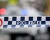 Police lob flash grenades as they storm home in Sydney's west and arrest a man 