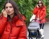 Emily Ratajkowski bundles up in a red jacket for lunch in New York with her son ...