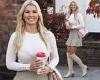 Christine McGuinness puts on leggy display in knee-high boots and mini skirt as ...