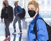 Kristen Stewart rocks jeans and a coat for flight out of New York airport with ...
