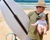 Bindi Irwin and Chandler Powell take their baby daughter Grace Warrior surfing