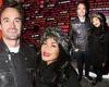 Nicole Scherzinger wraps up warm in faux fur headband as she poses arm-in-arm ...
