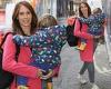 Alex Jones beams a smile as she carries her two-year-old son Kit to the Disney ...