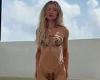 Model Gabrielle Epstein risks a wardrobe malfunction as she poses in a tiny  ...