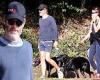 Chris Pine sports shorts and a sweater while on a walk with Annabelle Wallis ...