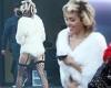 Miley Cyrus sports a furry white coat with sexy black fishnets nylons for a ...