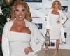Aisleyne Horgan-Wallace puts on a busty display in clinging white dress
