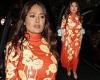 Salma Hayek sizzles in an eye-catching orange and gold floral sequinned gown