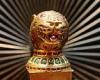 Gold tiger's head worth £1.5million must stay in the UK under a temporary ...