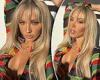 Tammy Hembrow goes braless and flaunts her ample assets in a see-through blouse
