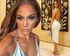 Jennifer Lopez shows curves in baby blue dress as she models JLo Beauty makeup: ...