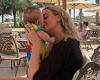 Perrie Edwards cradles her baby son Axel on family holiday 