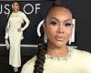 Vivica A Fox turns up the glam factor in figure-hugging frock at starry House ...
