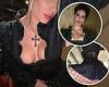 Halsey showcases her cleavage in a sexy Goth-inspired ensemble as she attends ...