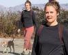 Alicia Silverstone takes her dog for a walk through the hills of Los Angeles in ...