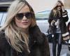 Laura Whitmore wraps up in a chocolate brown fur coat as she signs on at Radio ...