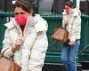 Katie Holmes shields herself from the chilly temperatures in white windbreaker ...