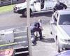 Australia: Terrifying moment teenager forced to ground gunpoint police BMW ...