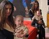 Emily Ratajkowski looks chic as she cuddles up with son Sylvester, eight ...