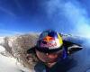 Wingsuit pilot becomes the first person to fly in and out of an active volcano ...