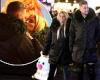Katie Price, 43, and Carl Woods, 32, share kisses at Winter Wonderland