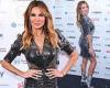 Lizzie Cundy flashes her ample assets in a silver mini dress at TRIC Christmas ...