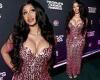 Cardi B showcases her famous curves in a VERY busty pink sparkly dress at the ...