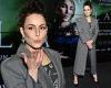 Noomi Rapace looks sharp in a grey trouser suit and floral cami at The Lamb ...