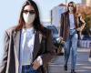 Kendall Jenner cuts a businesslike figure in a brown jacket while stepping out ...