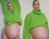 Ashley Graham puts her bump on display in lime green sweater